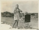 Image of Iceland girl with baby carriage